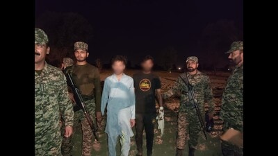 The border security force (BSF) officials repatriate two Pakistan nationals who had crossed over to India inadvertently.