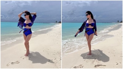 Sunny Leone is living it up in Maldives. The actor recently flew to the island country for a vacation and since then she has been busy giving us all kinds of travel goals with snippets from her beach diaries. The actor dropped a fresh set of pictures of herself taking a stroll by the beach in stunning swimwear and we are smitten. Take a look at her ensemble here. (Instagram/@sunnyleone) Sunny Leone is living it up in Maldives. The actor recently flew to the island country for a vacation and since then she has been busy giving us all kinds of travel goals with snippets from her beach diaries. The actor dropped a fresh set of pictures of herself taking a stroll by the beach in stunning swimwear and we are smitten. Take a look at her ensemble here. (Instagram/@sunnyleone)