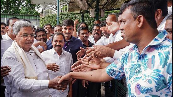 Karnataka chief minister Siddaramaiah listens to the grievances of public, in Bengaluru, onTuesday. (PTI)
