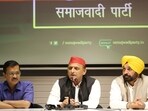 Akhilesh Yadav National President of Samajwadi Party, Arvind Kejriwal, Delhi Chief Minister and Bhagwant Mann, Chief Minister of Punjab during a press conference at Samajwadi Party office in Lucknow. (Photo by Deepak Gupta Hindustan Times)
