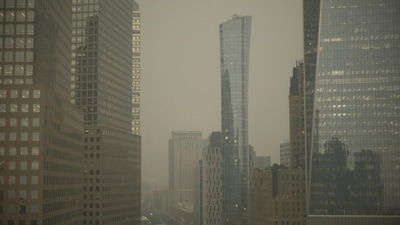 Buildings in lower Manhattan in New York are partially obscured by smoke from Canadian wildfires on June 6. About 3.3 million hectares have already burned, some 13 times the 10-year average, and more than 120,000 people have been temporarily forced out of their homes, reported Reuters.&nbsp; (Patrick Sison / AP)