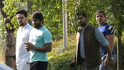 Wrestlers Bajrang Punia and Sakshee Malikkh meet Union Sports Minister Anurag Thakur, at his residence. (ANI/ Jitender Gupta) Wrestlers Bajrang Punia and Sakshee Malikkh meet Union Sports Minister Anurag Thakur, at his residence. (ANI/ Jitender Gupta)