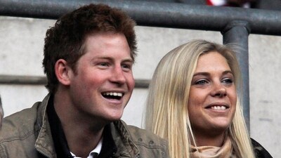 Britain's Prince Harry and Chelsy Davy attend the friendly international rugby union match between England and Australia at Twickenham in London on November 7, 2009. (REUTERS)