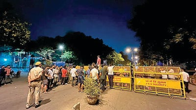 Barricades at the JNU main gate on Tuesday night. (HT PHOTO) Barricades at the JNU main gate on Tuesday night. (HT PHOTO)