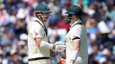 Australia's Steven Smith,right congratulates Australia's Travis Head for getting 50 runs not out on the first day of the ICC World Test Championship Final between India and Australia at The Oval cricket ground in London, Wednesday, June 7, 2023. (AP Photo/Kirsty Wigglesworth) (AP) Australia's Steven Smith,right congratulates Australia's Travis Head for getting 50 runs not out on the first day of the ICC World Test Championship Final between India and Australia at The Oval cricket ground in London, Wednesday, June 7, 2023. (AP Photo/Kirsty Wigglesworth) (AP)