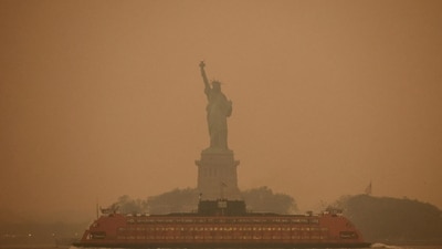 The Statue of Liberty is covered in haze and smoke caused by wildfires in Canada, in New York, US, June 6. (REUTERS)