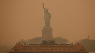 The Statue of Liberty is covered in haze and smoke caused by wildfires in Canada, in New York, US, June 6. (REUTERS)