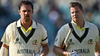 Australia's Travis Head and Australia's Steve Smith walk back to the pavilion after putting unbeaten 200 runs. (AFP) Australia's Travis Head and Australia's Steve Smith walk back to the pavilion after putting unbeaten 200 runs. (AFP)