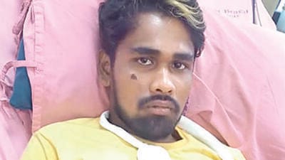 Helaram Malik, Biswajit’s father said that rescuers who were bringing out bodies from the compartments thought he was dead. (HT PHOTO) Helaram Malik, Biswajit’s father said that rescuers who were bringing out bodies from the compartments thought he was dead. (HT PHOTO)