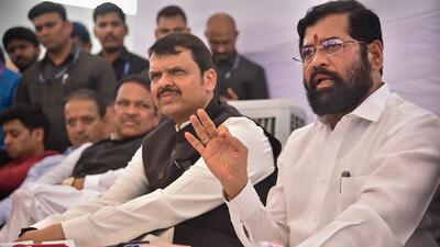 Maharashtra chief minister Eknath Shinde with his deputy Devendra Fadnavis in Navi Mumbai. (PTI)