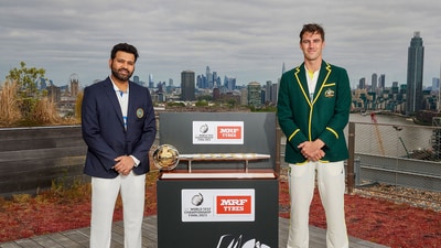 Rohit Sharma (L) with Pat Cummins (PTI)
