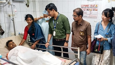 A Nepali couple meets their son, Ramananda Paswan, who suffered injuries in the triple-train accident, at SCB Medical College and Hospital in Cuttack. (PTI) A Nepali couple meets their son, Ramananda Paswan, who suffered injuries in the triple-train accident, at SCB Medical College and Hospital in Cuttack. (PTI)