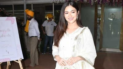 Ridhima Pandit opted for white and golden ethnic wear and heels. She posed for the camera outside the wedding venue. Ridhima Pandit opted for white and golden ethnic wear and heels. She posed for the camera outside the wedding venue.