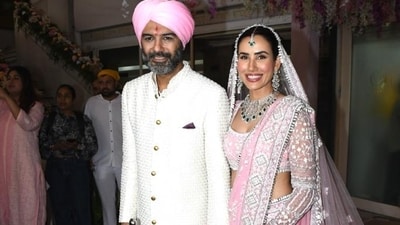 After their wedding, Sonnalli Seygall and Ashesh L Sajnani made their first appearance as a married couple. Sonnalli draped a pink and white saree, veil and jewellery for the special ocassion. Ashesh was seen in a white sherwani, trousers and shoes. He also wore for a pink turban. After their wedding, Sonnalli Seygall and Ashesh L Sajnani made their first appearance as a married couple. Sonnalli draped a pink and white saree, veil and jewellery for the special ocassion. Ashesh was seen in a white sherwani, trousers and shoes. He also wore for a pink turban.