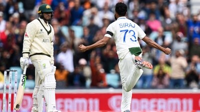 TOPSHOT - India's Mohammed Siraj (R) celebrates taking the wicket of Australia's Usman Khawaja (L) during day 1 of the ICC World Test Championship cricket final match between Australia and India at The Oval, in London, on June 7, 2023. (Photo by Glyn KIRK / AFP) / RESTRICTED TO EDITORIAL USE. NO ASSOCIATION WITH DIRECT COMPETITOR OF SPONSOR, PARTNER, OR SUPPLIER OF THE ECB (AFP) TOPSHOT - India's Mohammed Siraj (R) celebrates taking the wicket of Australia's Usman Khawaja (L) during day 1 of the ICC World Test Championship cricket final match between Australia and India at The Oval, in London, on June 7, 2023. (Photo by Glyn KIRK / AFP) / RESTRICTED TO EDITORIAL USE. NO ASSOCIATION WITH DIRECT COMPETITOR OF SPONSOR, PARTNER, OR SUPPLIER OF THE ECB (AFP)