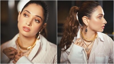 In the end, Tamannaah chose subtle shimmering pink eye shadow, sleek eyeliner, mascara on the lashes, feathered brows, glossy pink lips, rouged cheeks, and highlighted dewy face. A sleek pulled-back ponytail gave the finishing touch. (Instagram) In the end, Tamannaah chose subtle shimmering pink eye shadow, sleek eyeliner, mascara on the lashes, feathered brows, glossy pink lips, rouged cheeks, and highlighted dewy face. A sleek pulled-back ponytail gave the finishing touch. (Instagram)