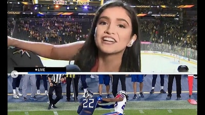 US journalist fends off fan while live reporting. (Instagram/@NFL México) US journalist fends off fan while live reporting. (Instagram/@NFL México)