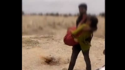 Screengrab of the video showing a woman being forcibly married off in Rajasthan's Jaisalmer. (Twitter/Swati Maliwal)
