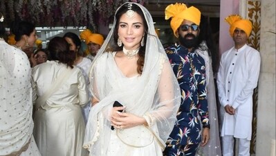 Shama Sikander wore a cream and golden dress. She covered her head with her dupatta. The actor also opted for traditional jewellery. Shama Sikander wore a cream and golden dress. She covered her head with her dupatta. The actor also opted for traditional jewellery.