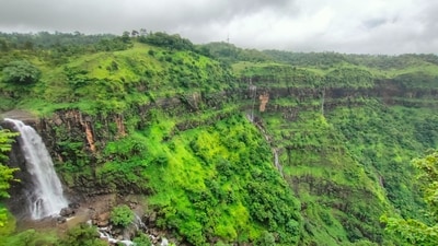 Chikhaldara, Maharashtra: Nestled in the Satpura Range of Maharashtra, Chikhaldara is a lesser-known hill station famous for its misty valleys, cascading waterfalls, and wildlife-rich forests. It is the only coffee-growing area in the state and offers a pleasant climate throughout the year. Visit the beautiful Bhimkund Waterfall, go on a wildlife safari in the Melghat Tiger Reserve, and enjoy the serene beauty of Chikhaldara. (Unsplash) Chikhaldara, Maharashtra: Nestled in the Satpura Range of Maharashtra, Chikhaldara is a lesser-known hill station famous for its misty valleys, cascading waterfalls, and wildlife-rich forests. It is the only coffee-growing area in the state and offers a pleasant climate throughout the year. Visit the beautiful Bhimkund Waterfall, go on a wildlife safari in the Melghat Tiger Reserve, and enjoy the serene beauty of Chikhaldara. (Unsplash)