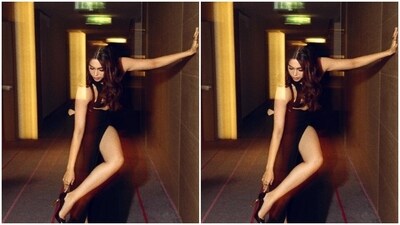 Sharvari looked stunning in the black bodycon gown with cut-out details at the torso and the midriff, cascading to a flowy skirt with a thigh high slit and a train. (Instagram/@sharvari) Sharvari looked stunning in the black bodycon gown with cut-out details at the torso and the midriff, cascading to a flowy skirt with a thigh high slit and a train. (Instagram/@sharvari)