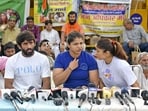 The protesting wrestlers speak to the media.