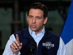 FILE - Republican presidential candidate Florida Gov. Ron DeSantis speaks during a campaign event on May 31, 2023, in Salix, Iowa. Mark Seitz, the Roman Catholic bishop of El Paso, Texas, tells The Associated Press that Florida Gov. Ron DeSantis' flights of migrants from the Texas border to California are "reprehensible" and "not morally acceptable." (AP Photo/Charlie Neibergall, File)