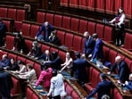 5-Star Movement lawmaker Gilda Sportiello nurses her child in the Italian lower Chamber in Rome. 5-Star Movement lawmaker Gilda Sportiello nurses her child in the Italian lower Chamber in Rome.