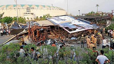 A huge hoarding fell over an SUV outside Ekana Sports City in Lucknow, on June 5. (HT FILE PHOTO) A huge hoarding fell over an SUV outside Ekana Sports City in Lucknow, on June 5. (HT FILE PHOTO)