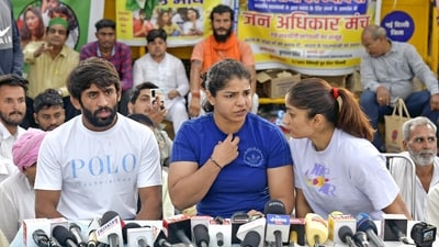 The protesting wrestlers speak to the media. (ANI)