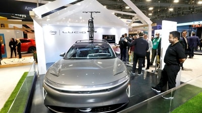 A Lucid Air electric car with built-in Alexa is displayed in an Amazon booth during CES 2023, an annual consumer electronics trade show, in Las Vegas, (REUTERS)