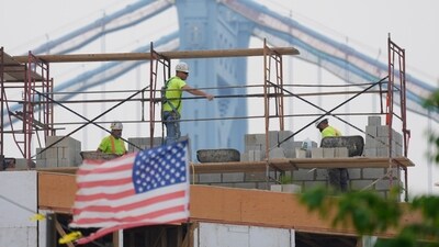 File - Masons work during hazy conditions in Philadelphia, Wednesday, June 7, 2023. The haze from Canada's wildfires is taking its toll on outdoor workers along the Eastern U.S. who carried on with their jobs even as dystopian orange skies forced the cancelation of sports events, school field trips and Broadway plays. (AP) File - Masons work during hazy conditions in Philadelphia, Wednesday, June 7, 2023. The haze from Canada's wildfires is taking its toll on outdoor workers along the Eastern U.S. who carried on with their jobs even as dystopian orange skies forced the cancelation of sports events, school field trips and Broadway plays. (AP)