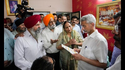 External affairs minister S Jaishankar with the families of 1984 riot victims' in New Delhi on Thursday. (PTI)