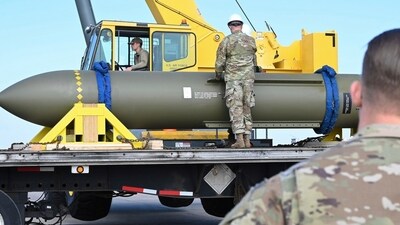 An airmen look at a GBU-57, or the Massive Ordnance Penetrator bomb, at Whiteman Air Base in Missouri. (AP) An airmen look at a GBU-57, or the Massive Ordnance Penetrator bomb, at Whiteman Air Base in Missouri. (AP)