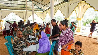 Locals at a medical camp organised by the Assam Rifles for people of violence-hit areas in Manipur. (PTI) Locals at a medical camp organised by the Assam Rifles for people of violence-hit areas in Manipur. (PTI)