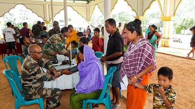Locals at a medical camp organised by the Assam Rifles for people of violence-hit areas in Manipur. (PTI) Locals at a medical camp organised by the Assam Rifles for people of violence-hit areas in Manipur. (PTI)
