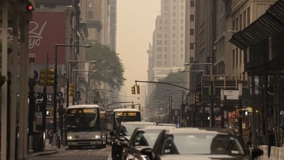 Buildings shrouded in smoke from Canada wildfires in New York, US. (Bloomberg) Buildings shrouded in smoke from Canada wildfires in New York, US. (Bloomberg)