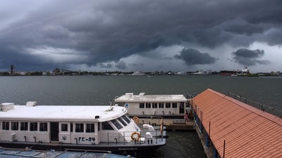 Dark clouds cover the city skyline during the onset of monsoon over Kerala a week later than usual, in Kochi, Thursday, June 8, 2023. (PTI)