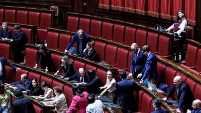 5-Star Movement lawmaker Gilda Sportiello nurses her child in the Italian lower Chamber in Rome. (AP) 5-Star Movement lawmaker Gilda Sportiello nurses her child in the Italian lower Chamber in Rome. (AP)