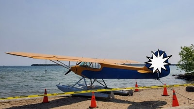 Partgoers salvage a sinking plane in Ontario. (Facebook/@South Simcoe Police)
