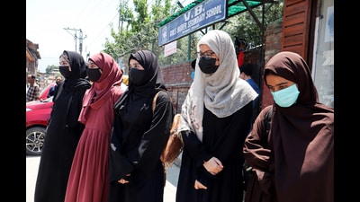 Students of Vishwa Bharti Girls Higher Secondary School, Rainawari Srinagar, protest against the School administration for allegedly not allowing students to enter the school premises wearing 'Abaya', in Srinagar on Thursday. The students boycotted the classes. (ANI) Students of Vishwa Bharti Girls Higher Secondary School, Rainawari Srinagar, protest against the School administration for allegedly not allowing students to enter the school premises wearing 'Abaya', in Srinagar on Thursday. The students boycotted the classes. (ANI)