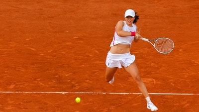 French: Poland's Iga Swiatek in action during her semi final match against Brazil's Beatriz Haddad Maia. (REUTERS)