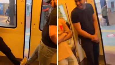The image shows two men travelling in Delhi Metro stopping a door from closing. (Twitter/@imb0yaman) The image shows two men travelling in Delhi Metro stopping a door from closing. (Twitter/@imb0yaman)