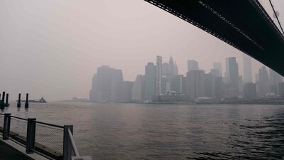 A view of the Lower Manhattan skyline and Brooklyn Bridge in a dense hazy sky at sunset on June 7 in New York City. Smoke and haze from large forest fires in Canada have covered the New York City region, blocking out sunlight and pushing the air quality index to hazardous levels. (Getty Images via AFP) A view of the Lower Manhattan skyline and Brooklyn Bridge in a dense hazy sky at sunset on June 7 in New York City. Smoke and haze from large forest fires in Canada have covered the New York City region, blocking out sunlight and pushing the air quality index to hazardous levels. (Getty Images via AFP)