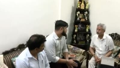 External affairs minister S Jaishankar interacts with a student who had returned from Ukraine.
