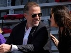 Hunter Biden, son of President Joe Biden, talks with his sister Ashley Biden.