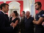 Henri, right, meets French President Emmanuel Macron in Annecy, French Alps, Friday. Henri, right, meets French President Emmanuel Macron in Annecy, French Alps, Friday.