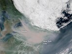The satellite image show smoke enveloping New York City. The satellite image show smoke enveloping New York City.