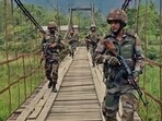 Security personnel conduct Joint Combing Operations in sensitive areas both the Hills and Valley sectors of Manipur on Thursday. (Pitamber Newar)