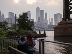 The Manhattan skyline is seen as smoke from wildfires in Canada cause hazy conditions in New York City on June 8, 2023. The Manhattan skyline is seen as smoke from wildfires in Canada cause hazy conditions in New York City on June 8, 2023.